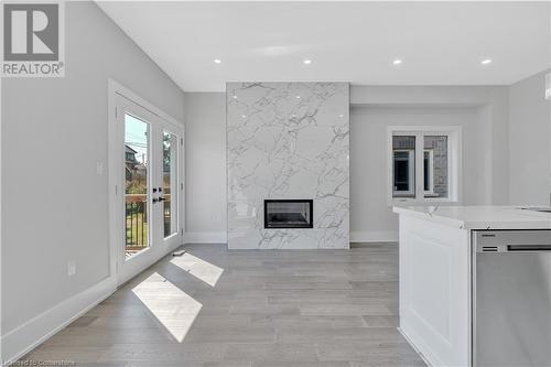 86 Beland Avenue N, Hamilton, ON - Indoor Photo Showing Living Room With Fireplace