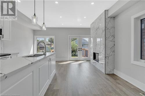 86 Beland Avenue N, Hamilton, ON - Indoor Photo Showing Kitchen With Fireplace With Upgraded Kitchen