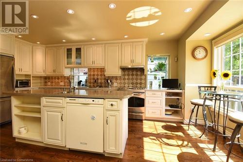 Kitchen with Hardwood flooring - 24 John Street E, Waterdown, ON - Indoor Photo Showing Kitchen