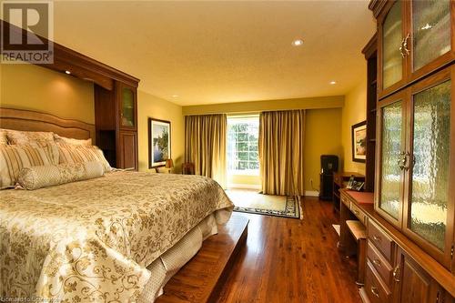 Primary Bedroom with Hardwood floors - 24 John Street E, Waterdown, ON - Indoor Photo Showing Bedroom