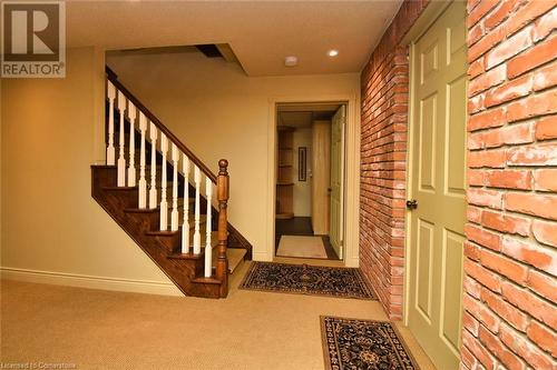 Stairs to Basement Brick from Old Coach House - 24 John Street E, Waterdown, ON - Indoor Photo Showing Other Room