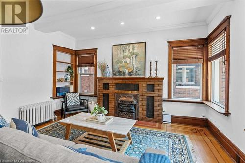 99 Balsam Avenue S, Hamilton, ON - Indoor Photo Showing Living Room With Fireplace