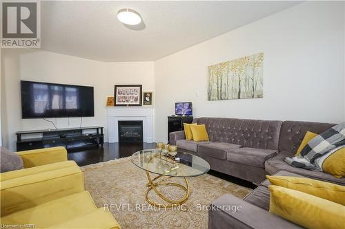 11 Cirillo Street, Brampton, ON - Indoor Photo Showing Living Room With Fireplace