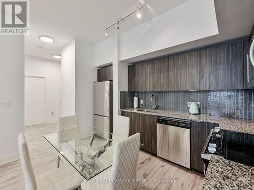 542 - 20 Shore Breeze Drive, Toronto, ON - Indoor Photo Showing Kitchen With Stainless Steel Kitchen