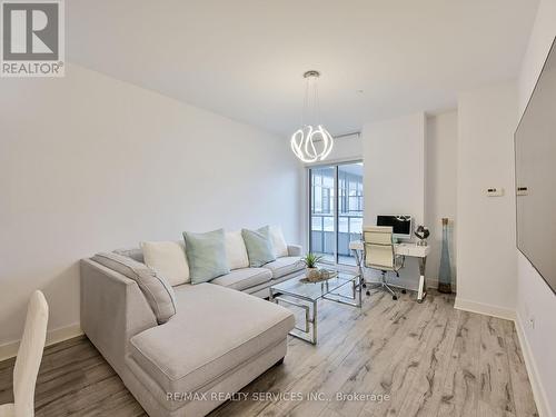 542 - 20 Shore Breeze Drive, Toronto, ON - Indoor Photo Showing Living Room