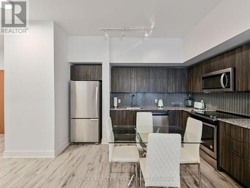 542 - 20 Shore Breeze Drive, Toronto, ON - Indoor Photo Showing Kitchen With Stainless Steel Kitchen With Upgraded Kitchen