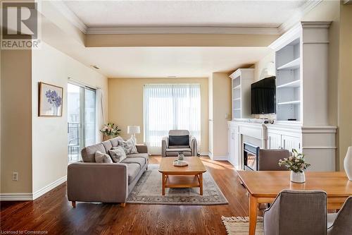 virtually staged - 3000 Creekside Drive Unit# 801, Dundas, ON - Indoor Photo Showing Other Room With Fireplace