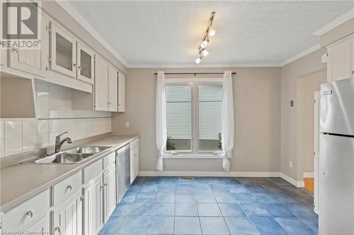 8169 Michael Street, Niagara Falls, ON - Indoor Photo Showing Kitchen With Double Sink