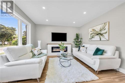 66 Howe Avenue, Hamilton, ON - Indoor Photo Showing Living Room With Fireplace