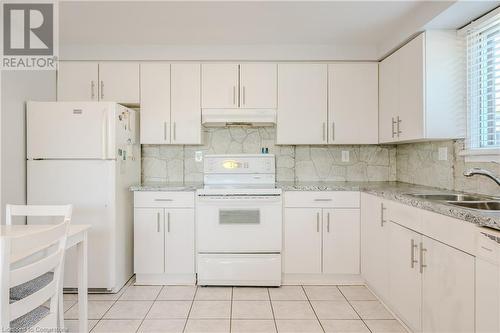 25 Brant Street, Hamilton, ON - Indoor Photo Showing Kitchen With Double Sink