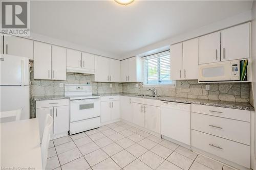 25 Brant Street, Hamilton, ON - Indoor Photo Showing Kitchen With Double Sink