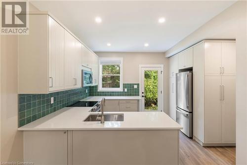 452 Jackson Street W, Hamilton, ON - Indoor Photo Showing Kitchen With Double Sink