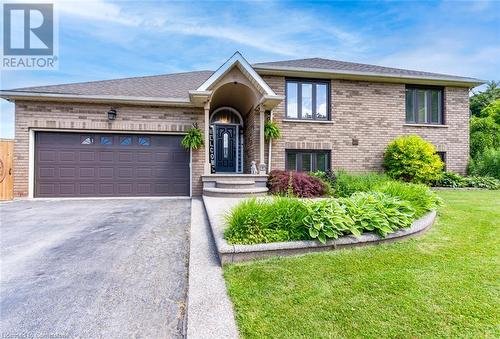 Fully landscaped, Sprinkler system installed - 91 Hedge Lawn Drive, Grimsby, ON - Outdoor With Facade