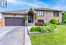 Fully landscaped, Sprinkler system installed - 91 Hedge Lawn Drive, Grimsby, ON  - Outdoor With Facade 