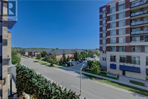 1940 Ironstone Drive Unit# 304, Burlington, ON - Outdoor With Balcony With Facade