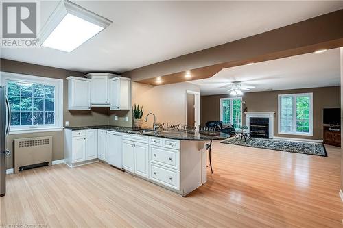 16 Durham Road, Stoney Creek, ON - Indoor Photo Showing Kitchen With Fireplace