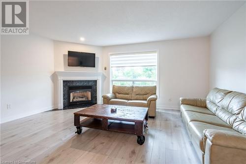 384 Limeridge Road E Unit# 11, Hamilton, ON - Indoor Photo Showing Living Room With Fireplace