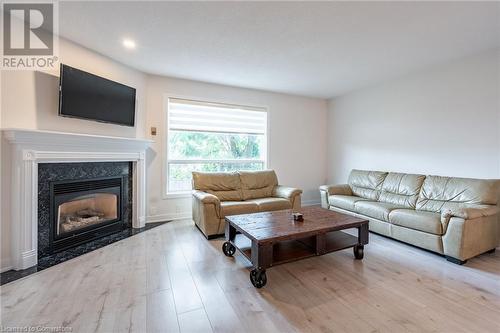 384 Limeridge Road E Unit# 11, Hamilton, ON - Indoor Photo Showing Living Room With Fireplace