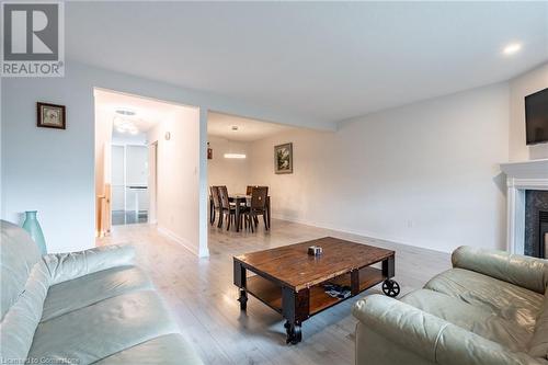 384 Limeridge Road E Unit# 11, Hamilton, ON - Indoor Photo Showing Living Room With Fireplace