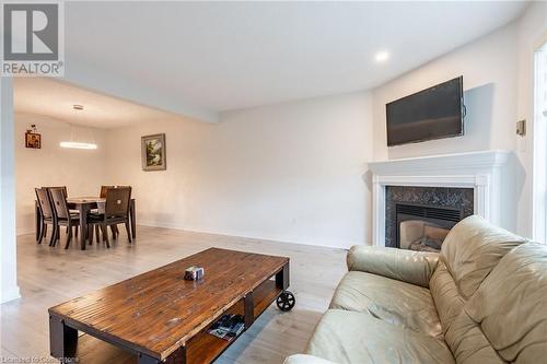 384 Limeridge Road E Unit# 11, Hamilton, ON - Indoor Photo Showing Living Room With Fireplace