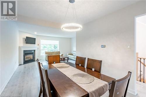 384 Limeridge Road E Unit# 11, Hamilton, ON - Indoor Photo Showing Dining Room With Fireplace