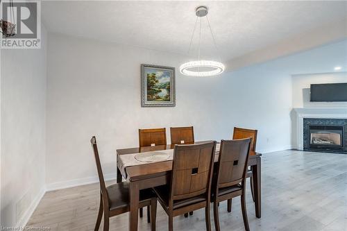 384 Limeridge Road E Unit# 11, Hamilton, ON - Indoor Photo Showing Dining Room With Fireplace