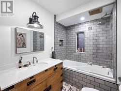 STUNNING 4-piece bathroom in upper unit (2nd flr). High-end fixtures, tub, and toilet. - 