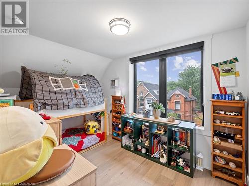 Bedroom #2 has a large window making it a bright space (upper unit - 3rd flr). Not pictured is the large closet! - 213 Caroline Street S, Hamilton, ON 