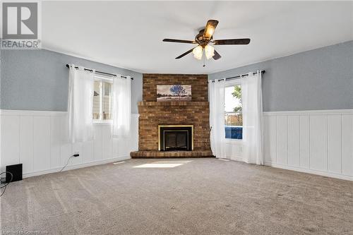 7693 Ronnie Crescent, Niagara Falls, ON - Indoor Photo Showing Other Room With Fireplace