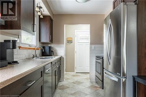 7976 Paddock Trail Drive, Niagara Falls, ON - Indoor Photo Showing Kitchen With Double Sink