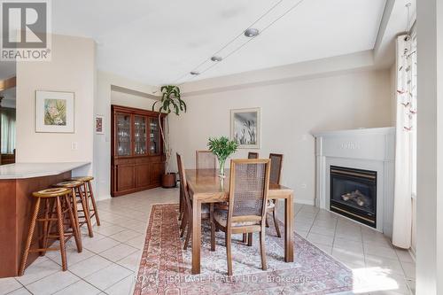 35 Queens Plate Drive, Markham, ON - Indoor Photo Showing Dining Room With Fireplace