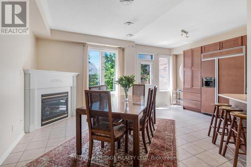 35 Queens Plate Drive, Markham, ON - Indoor Photo Showing Dining Room With Fireplace