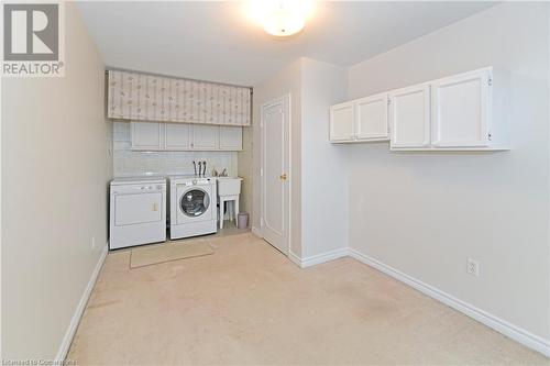 Den with en-suite laundry and balcony - 2001 Bonnymede Drive Unit# 140, Mississauga, ON - Indoor Photo Showing Laundry Room