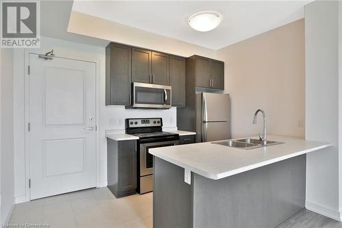 2486 Old Bronte Road Unit# 706, Oakville, ON - Indoor Photo Showing Kitchen With Double Sink