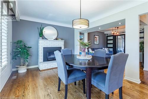 27 Collier Crescent, Hamilton, ON - Indoor Photo Showing Dining Room With Fireplace