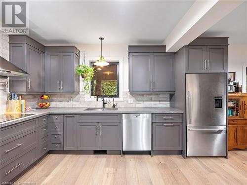 Kitchen in upper unit (2nd flr). Built-in oven with warming drawer, built-in stove top with hood vent and pot-filler! - 213 Caroline Street S, Hamilton, ON - Indoor Photo Showing Kitchen