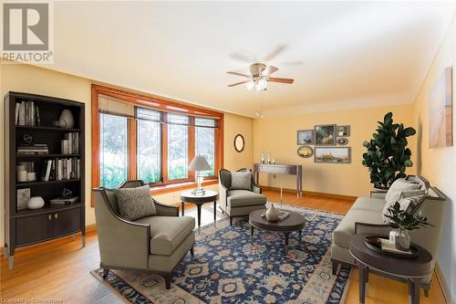 Virtually Staged Livingroom - 405 Inverness Avenue E, Hamilton, ON - Indoor Photo Showing Living Room