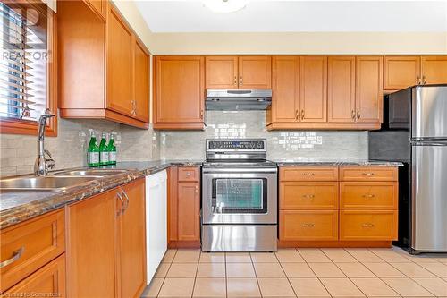 99 Donn Avenue Unit# 708, Stoney Creek, ON - Indoor Photo Showing Kitchen With Double Sink