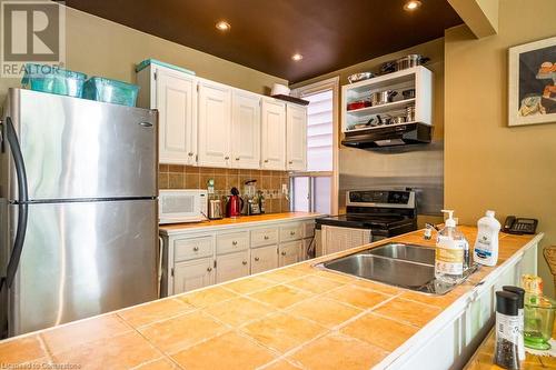 213 Park Street N, Hamilton, ON - Indoor Photo Showing Kitchen With Double Sink