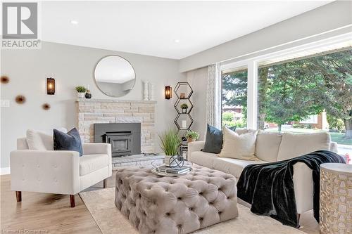 20 Geneva Drive, Hamilton, ON - Indoor Photo Showing Living Room With Fireplace