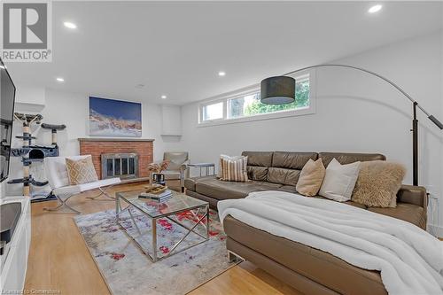 20 Geneva Drive, Hamilton, ON - Indoor Photo Showing Living Room With Fireplace