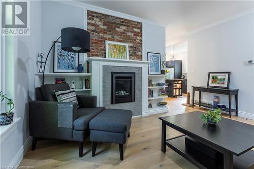 102 Alma Street, Hamilton, ON - Indoor Photo Showing Living Room With Fireplace