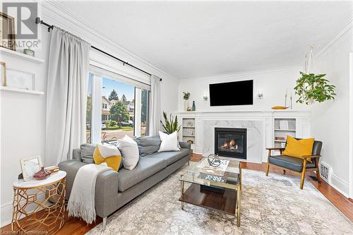 80 Huxley Avenue S, Hamilton, ON - Indoor Photo Showing Living Room With Fireplace