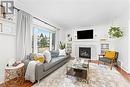 80 Huxley Avenue S, Hamilton, ON  - Indoor Photo Showing Living Room With Fireplace 