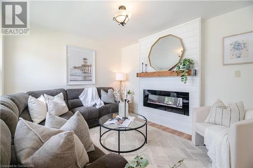 344 East 12Th Street, Hamilton, ON - Indoor Photo Showing Living Room With Fireplace