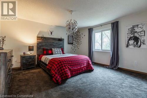 203 Bluebell Crescent, Ancaster, ON - Indoor Photo Showing Bedroom With Fireplace