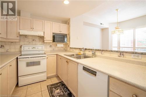 5188 Lakeshore Road Unit# 102, Burlington, ON - Indoor Photo Showing Kitchen With Double Sink