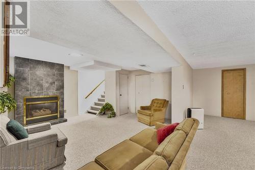 115 Organ Crescent, Hamilton, ON - Indoor Photo Showing Living Room With Fireplace