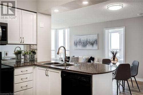 4090 Living Arts Drive Unit# 2308, Mississauga, ON - Indoor Photo Showing Kitchen With Double Sink