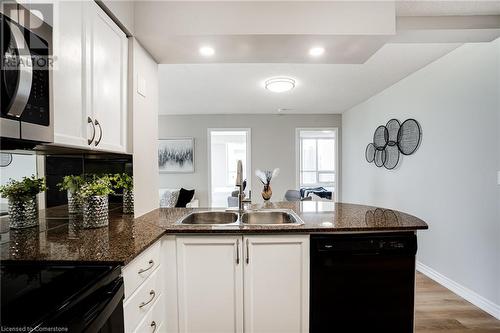 4090 Living Arts Drive Unit# 2308, Mississauga, ON - Indoor Photo Showing Kitchen With Double Sink